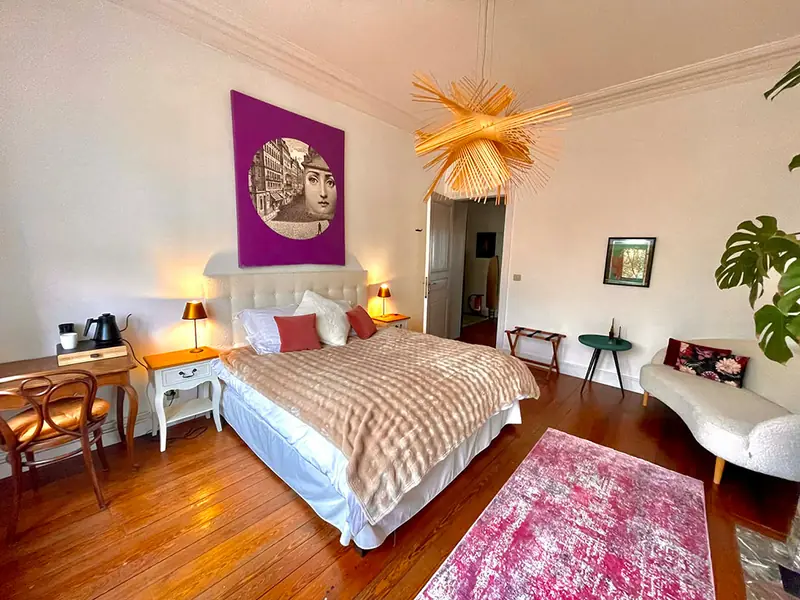 Room 1 with double bed and Art Nouveau window